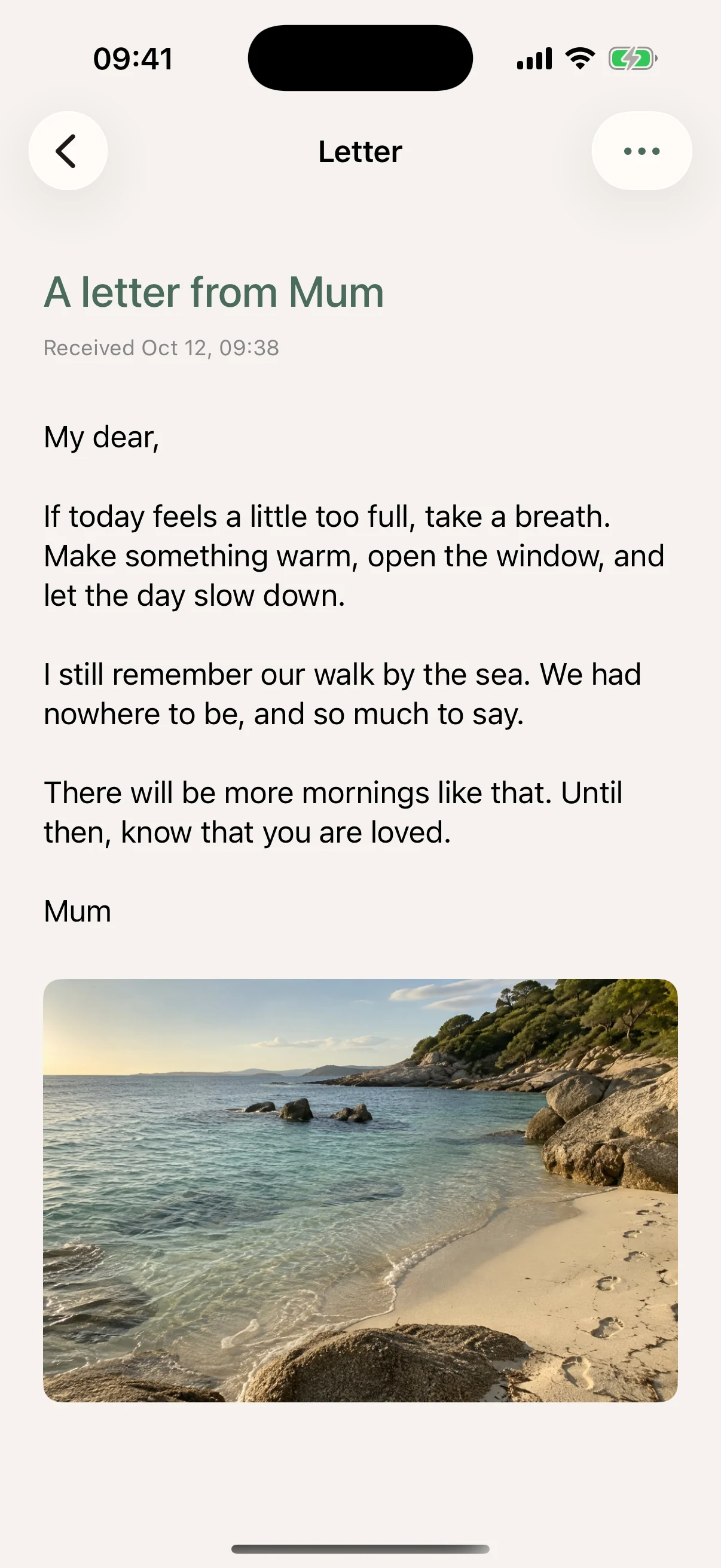 A letter from Mum with personal words and a seaside photo.